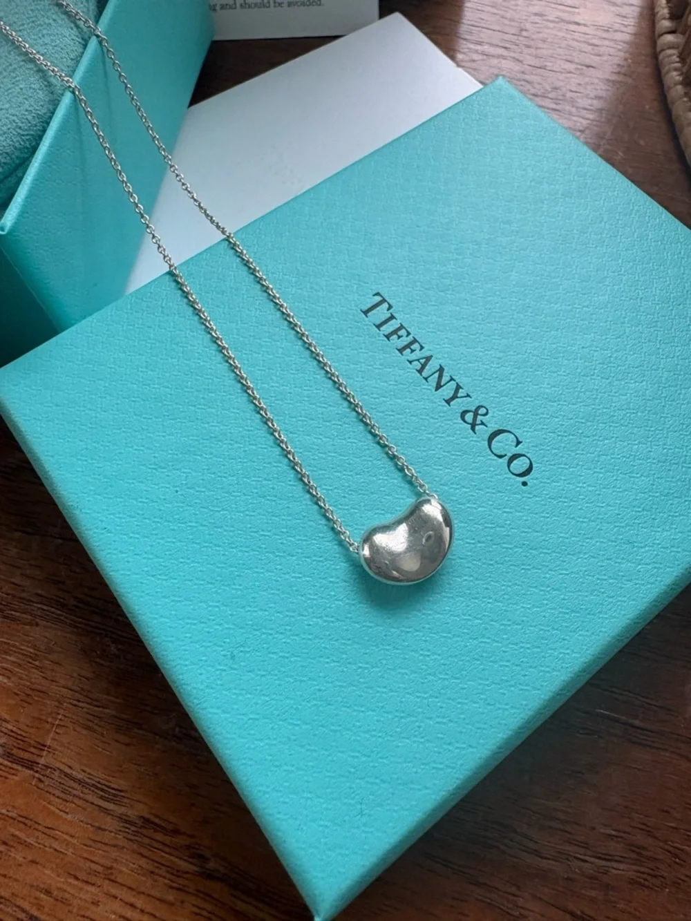 Tiffany & Co. Silver Bean Pendant Necklace with Tiffany Blue Accents - Picture 2 of 3